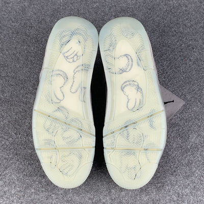 KAWS x Air Jordan 4 Retro 'Cool Grey' Sample