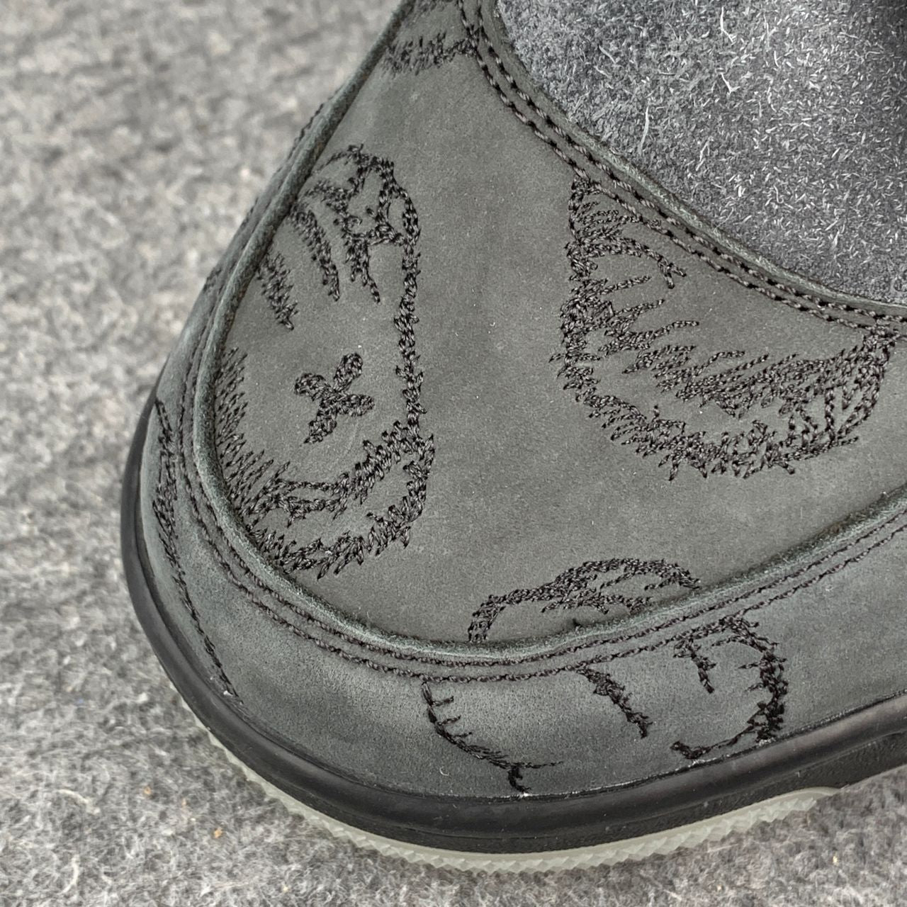 KAWS x Air Jordan 4 Retro 'Schwarz'