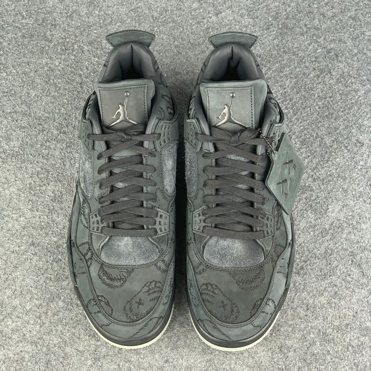 KAWS x Air Jordan 4 Retro 'Schwarz'