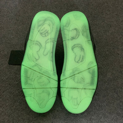 KAWS x Air Jordan 4 Retro 'Schwarz'