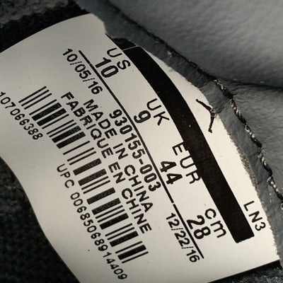KAWS x Air Jordan 4 Retro 'Cool Grey' Sample