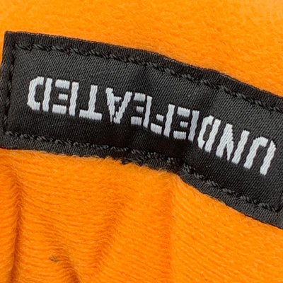 Undefeated x Air Jordan 4 Retro 2025