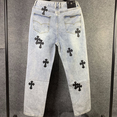 CHROME HEARTS Blue Jeans With Black Leather Crosses