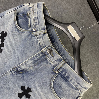 CHROME HEARTS Blue Jeans With Black Leather Crosses