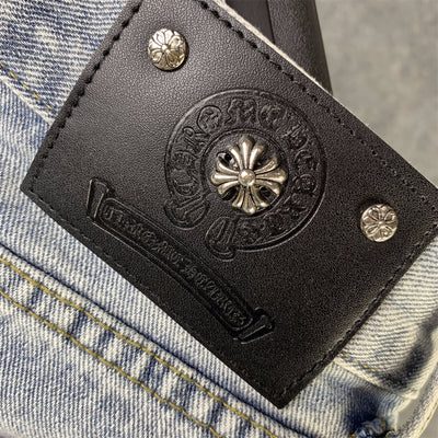 CHROME HEARTS Blue Jeans With Black Leather Crosses
