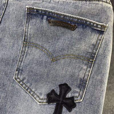 CHROME HEARTS Blue Jeans With Black Leather Crosses