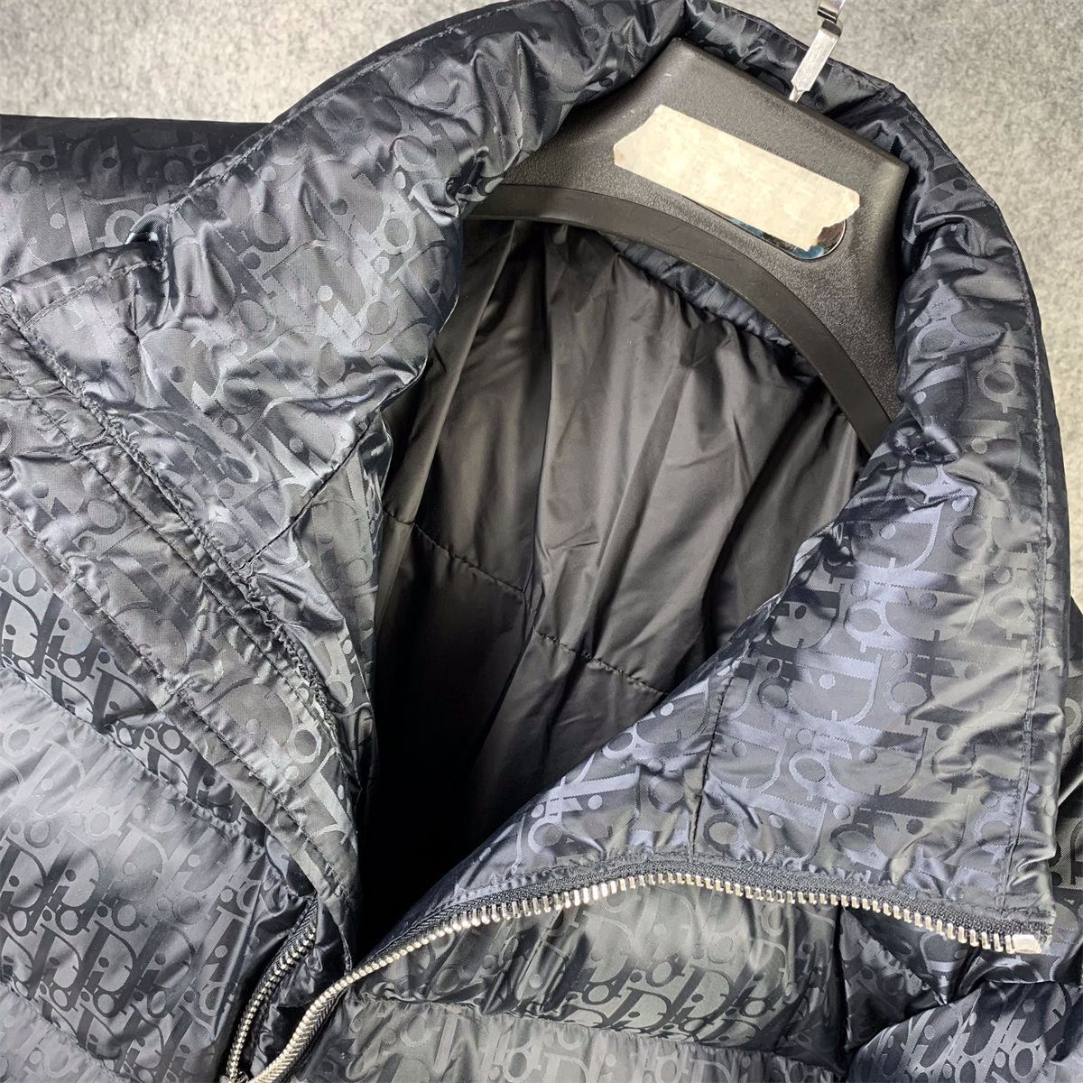 Oblique Motif Down Jacket in Navy Technical Jacquard