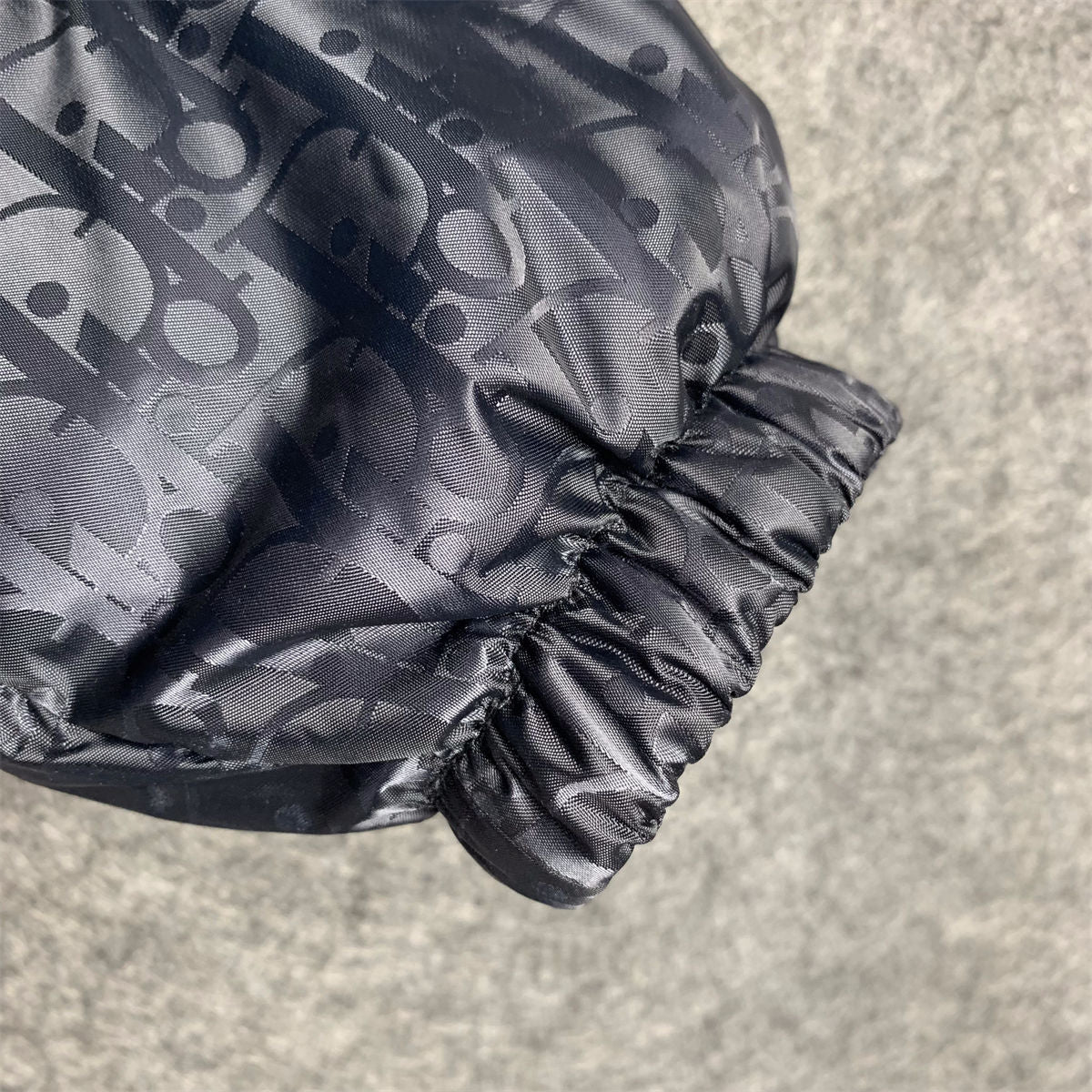 Oblique Motif Down Jacket in Navy Technical Jacquard