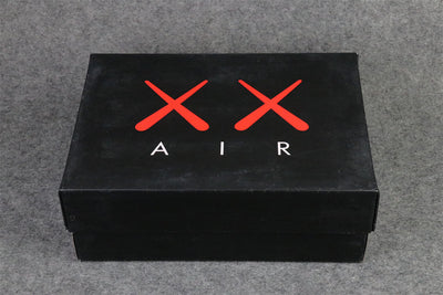 KAWS x Air Jordan 4 Retro 'Schwarz'